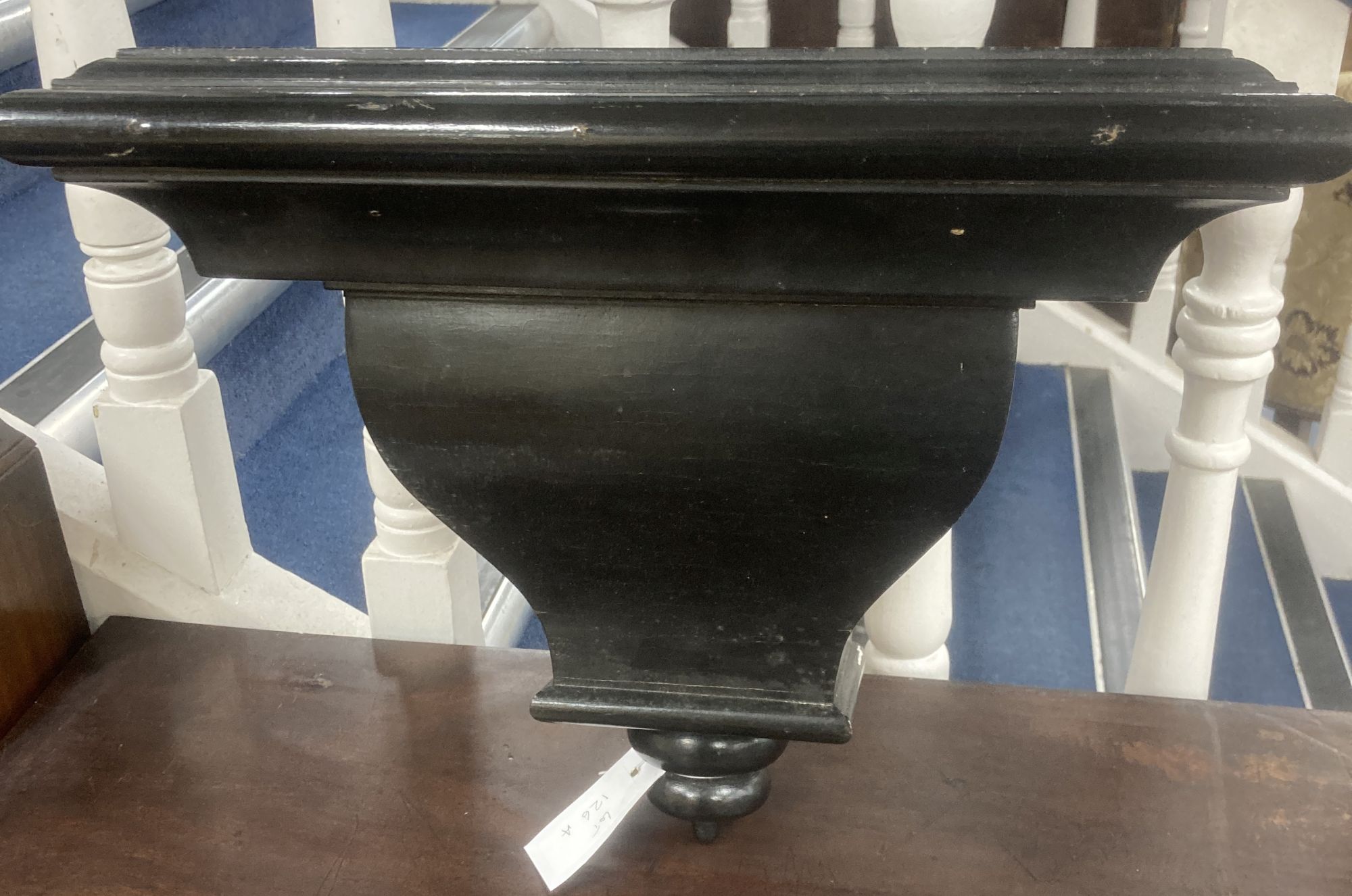 A Victorian ebonised wall bracket, width 40cm, depth 26cm, height 30cm